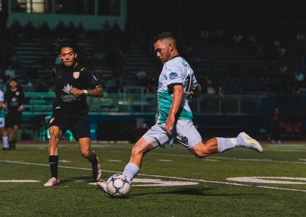 A Napa Valley player takes a shot during a match