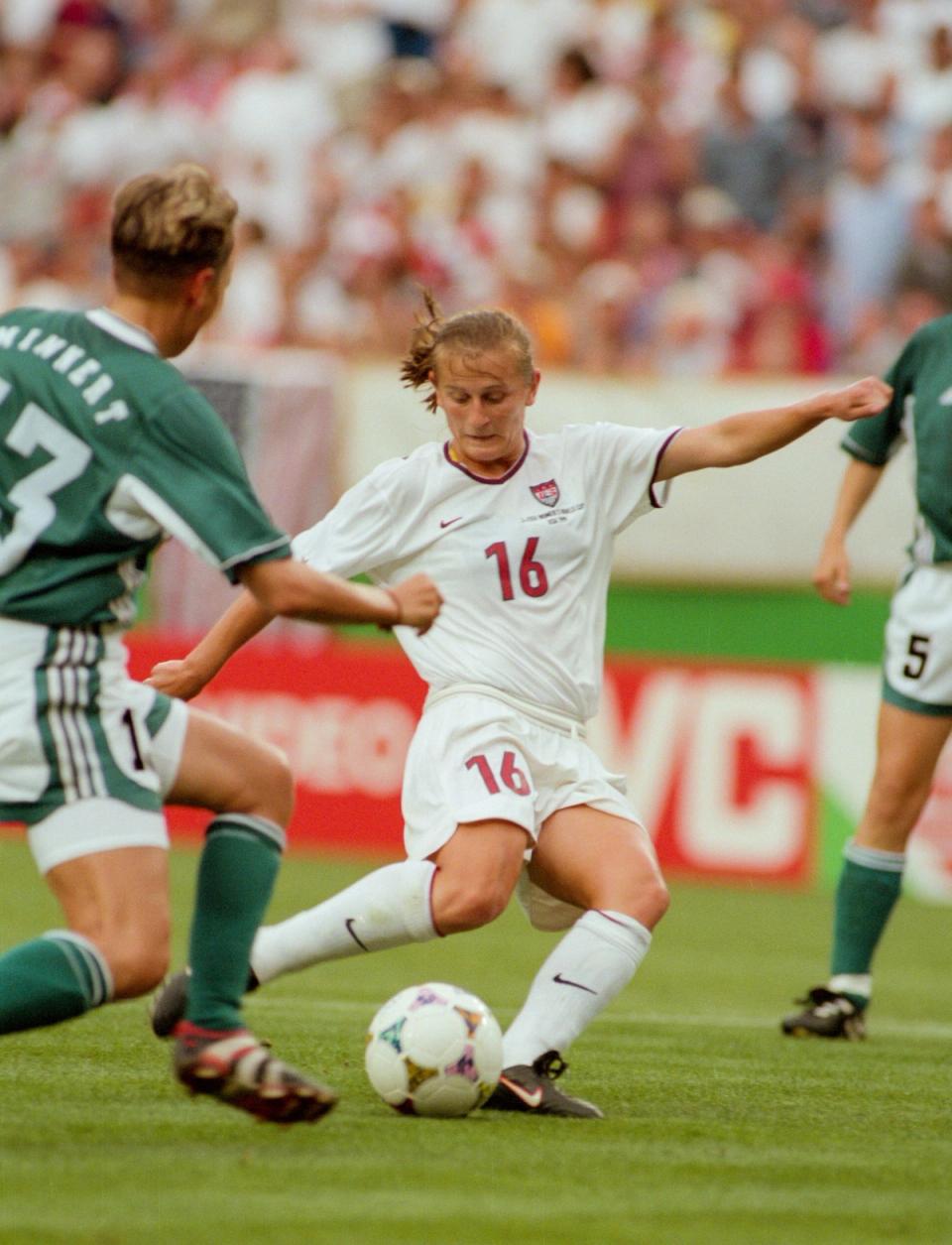 Foward Tiffeny Milbrett gets ready to shoot the ball during the match against Germany