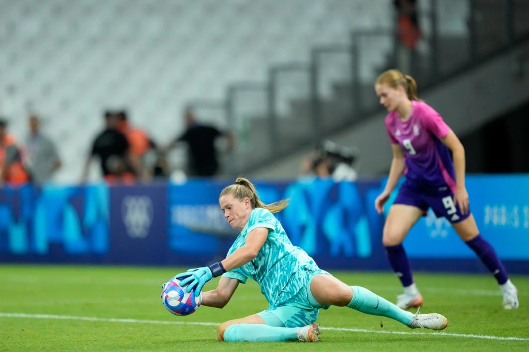 Alyssa Naeher makes as save during the USA's group stage win over Germany.​​​​‌﻿‍﻿​‍​‍‌‍﻿﻿‌﻿​‍‌‍‍‌‌‍‌﻿‌‍‍‌‌‍﻿‍​‍​‍​﻿‍‍​‍​‍‌﻿​﻿‌‍​‌‌‍﻿‍‌‍‍‌‌﻿‌​‌﻿‍‌​‍﻿‍‌‍‍‌‌‍﻿﻿​‍​‍​‍﻿​​‍​‍‌‍‍​‌﻿​‍‌‍‌‌‌‍‌‍​‍​‍​﻿‍‍​‍​‍‌‍‍​‌﻿‌​‌﻿‌​‌﻿​​‌﻿​﻿​﻿‍‍​‍﻿﻿​‍﻿﻿‌﻿‌‌‌﻿​﻿‌﻿​﻿‌‍‌‍​‍﻿‍‌﻿​﻿‌‍​‌‌‍﻿‍‌‍‍‌‌﻿‌​‌﻿‍‌​‍﻿‍‌﻿​﻿‌﻿‌​‌﻿‌‌‌‍‌​‌‍‍‌‌‍﻿﻿​‍﻿﻿‌‍‍‌‌‍﻿‍‌﻿‌​‌‍‌‌‌‍﻿‍‌﻿‌​​‍﻿﻿‌‍‌‌‌‍‌​‌‍‍‌‌﻿‌​​‍﻿﻿‌‍﻿‌‌‍﻿﻿‌‍‌​‌‍‌‌​﻿﻿‌‌﻿​​‌﻿​‍‌‍‌‌‌﻿​﻿‌‍‌‌‌‍﻿‍‌﻿‌​‌‍​‌‌﻿‌​‌‍‍‌‌‍﻿﻿‌‍﻿‍​﻿‍﻿‌‍‍‌‌‍‌​​﻿﻿‌​﻿​‌​﻿​​​﻿‌‌​﻿‍​‌‍‌‍‌‍‌‍‌‍​‌​﻿​​​‍﻿‌‌‍​﻿​﻿‍‌​﻿‌﻿​﻿‌​​‍﻿‌​﻿‌​‌‍​‍​﻿​​​﻿​‌​‍﻿‌​﻿‍​‌‍​﻿‌‍‌‍‌‍​‌​‍﻿‌​﻿‌​​﻿​​‌‍​﻿​﻿​​‌‍‌‍​﻿‍​‌‍​‌‌‍‌​‌‍‌‍‌‍‌‌‌‍‌‍‌‍​﻿​﻿‍﻿‌﻿‌​‌﻿‍‌‌﻿​​‌‍‌‌​﻿﻿‌‌﻿​﻿‌﻿‌​‌‍﻿﻿‌﻿​‍‌﻿‍‌​﻿‍﻿‌﻿​​‌‍​‌‌﻿‌​‌‍‍​​﻿﻿‌‌‍​﻿‌‍﻿﻿‌‍﻿‍‌﻿‌​‌‍‌‌‌‍﻿‍‌﻿‌​​‍‌‌​﻿‌‌‌​​‍‌‌﻿﻿‌‍‍﻿‌‍‌‌‌﻿‍‌​‍‌‌​﻿​﻿‌​‌​​‍‌‌​﻿​﻿‌​‌​​‍‌‌​﻿​‍​﻿​‍‌‍​﻿‌‍‌‍‌‍‌​‌‍‌‍​﻿‌﻿‌‍​﻿​﻿​﻿​﻿‌‌​﻿​‍​﻿​‍​﻿‌﻿‌‍​‌​‍‌‌​﻿​‍​﻿​‍​‍‌‌​﻿‌‌‌​‌​​‍﻿‍‌‍​‍‌‍﻿﻿‌‍‌​‌﻿‍‌‌‌‌​‌‍‌‌‌﻿‍​‌﻿‌​​‍‌‌​﻿‌‌‌​​‍‌‌﻿﻿‌‍‍﻿‌‍‌‌‌﻿‍‌​‍‌‌​﻿​﻿‌​‌​​‍‌‌​﻿​﻿‌​‌​​‍‌‌​﻿​‍​﻿​‍​﻿​﻿​﻿‌﻿​﻿​﻿‌‍‌‌​﻿​﻿‌‍‌‌​﻿‌﻿​﻿‍‌​﻿​﻿​﻿‌​‌‍​﻿​﻿​‍​‍‌‌​﻿​‍​﻿​‍​‍‌‌​﻿‌‌‌​‌​​‍﻿‍‌‍‍‌‌‍﻿‌‌‍​‌‌‍‌﻿‌‍‌‌​‍﻿‍‌‍​‌‌‍﻿​‌﻿‌​​﻿﻿﻿‌‍​‍‌‍​‌‌﻿​﻿‌‍‌‌‌‌‌‌‌﻿​‍‌‍﻿​​﻿﻿‌‌‍‍​‌﻿‌​‌﻿‌​‌﻿​​‌﻿​﻿​‍‌‌​﻿​﻿‌​​‌​‍‌‌​﻿​‍‌​‌‍​‍‌‌​﻿​‍‌​‌‍‌﻿‌‌‌﻿​﻿‌﻿​﻿‌‍‌‍​‍﻿‍‌﻿​﻿‌‍​‌‌‍﻿‍‌‍‍‌‌﻿‌​‌﻿‍‌​‍﻿‍‌﻿​﻿‌﻿‌​‌﻿‌‌‌‍‌​‌‍‍‌‌‍﻿﻿​‍‌‍‌‍‍‌‌‍‌​​﻿﻿‌​﻿​‌​﻿​​​﻿‌‌​﻿‍​‌‍‌‍‌‍‌‍‌‍​‌​﻿​​​‍﻿‌‌‍​﻿​﻿‍‌​﻿‌﻿​﻿‌​​‍﻿‌​﻿‌​‌‍​‍​﻿​​​﻿​‌​‍﻿‌​﻿‍​‌‍​﻿‌‍‌‍‌‍​‌​‍﻿‌​﻿‌​​﻿​​‌‍​﻿​﻿​​‌‍‌‍​﻿‍​‌‍​‌‌‍‌​‌‍‌‍‌‍‌‌‌‍‌‍‌‍​﻿​‍‌‍‌﻿‌​‌﻿‍‌‌﻿​​‌‍‌‌​﻿﻿‌‌﻿​﻿‌﻿‌​‌‍﻿﻿‌﻿​‍‌﻿‍‌​‍‌‍‌﻿​​‌‍​‌‌﻿‌​‌‍‍​​﻿﻿‌‌‍​﻿‌‍﻿﻿‌‍﻿‍‌﻿‌​‌‍‌‌‌‍﻿‍‌﻿‌​​‍‌‌​﻿‌‌‌​​‍‌‌﻿﻿‌‍‍﻿‌‍‌‌‌﻿‍‌​‍‌‌​﻿​﻿‌​‌​​‍‌‌​﻿​﻿‌​‌​​‍‌‌​﻿​‍​﻿​‍‌‍​﻿‌‍‌‍‌‍‌​‌‍‌‍​﻿‌﻿‌‍​﻿​﻿​﻿​﻿‌‌​﻿​‍​﻿​‍​﻿‌﻿‌‍​‌​‍‌‌​﻿​‍​﻿​‍​‍‌‌​﻿‌‌‌​‌​​‍﻿‍‌‍​‍‌‍﻿﻿‌‍‌​‌﻿‍‌‌‌‌​‌‍‌‌‌﻿‍​‌﻿‌​​‍‌‌​﻿‌‌‌​​‍‌‌﻿﻿‌‍‍﻿‌‍‌‌‌﻿‍‌​‍‌‌​﻿​﻿‌​‌​​‍‌‌​﻿​﻿‌​‌​​‍‌‌​﻿​‍​﻿​‍​﻿​﻿​﻿‌﻿​﻿​﻿‌‍‌‌​﻿​﻿‌‍‌‌​﻿‌﻿​﻿‍‌​﻿​﻿​﻿‌​‌‍​﻿​﻿​‍​‍‌‌​﻿​‍​﻿​‍​‍‌‌​﻿‌‌‌​‌​​‍﻿‍‌‍‍‌‌‍﻿‌‌‍​‌‌‍‌﻿‌‍‌‌​‍﻿‍‌‍​‌‌‍﻿​‌﻿‌​​‍​‍‌﻿﻿‌