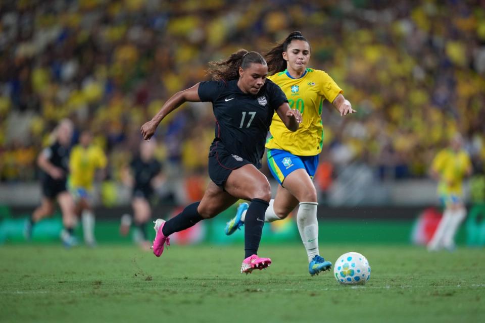 Michelle Cooper runs with the ball against Mariza of Brazil during the match between Brazil and United States at Arena Castelão on June 09, 2026 in Fortaleza, Brazil. (Photo by Brad Smith/USSF/Getty Images)