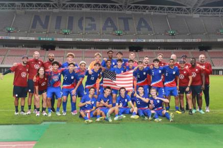 A US Youth Mens National Team takes a team photo in a stadium