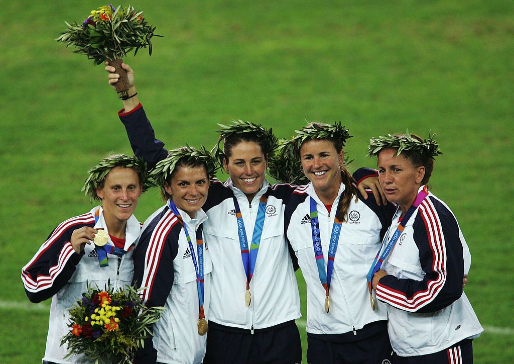 2004 Olympic team celebrating gold medal win