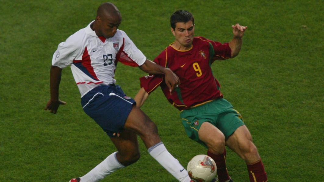 Eddie Pope challenged by Portugal’s Pauleta during the second half of the Portugal v USA, Group D, World Cup Group Stage match played at the Suwon World Cup Stadium, Suwon, South Korea on June 5, 2002. (Photo by Ben Radford/Getty Images)