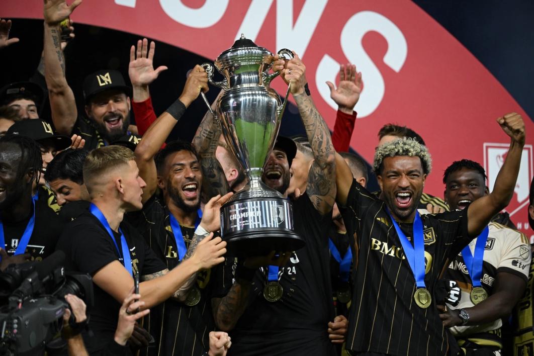 LAFC celebrate with the U.S. Open Cup trophy on stage following the 2024 final against Sporting KC