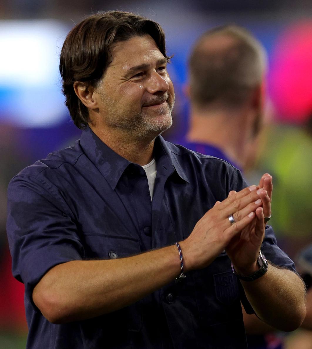 Mauricio Pochettino applauds the fans after the team's victory over Paraguay (Photo by John Dorton/USSF/Getty Images)