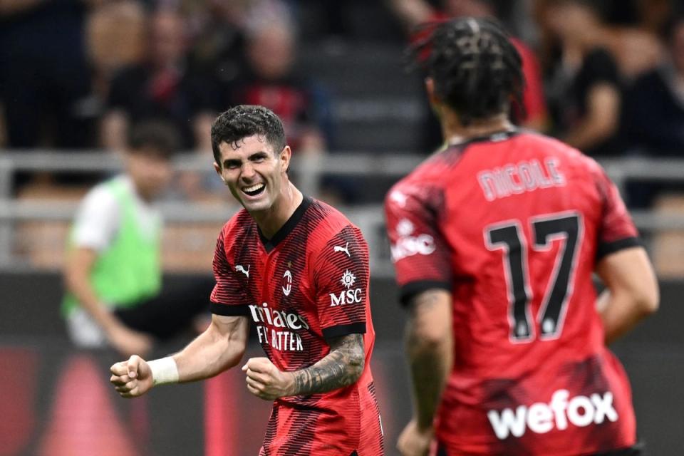Christian Pulisic celebrates during an AC Milan fixture on Mothers Day