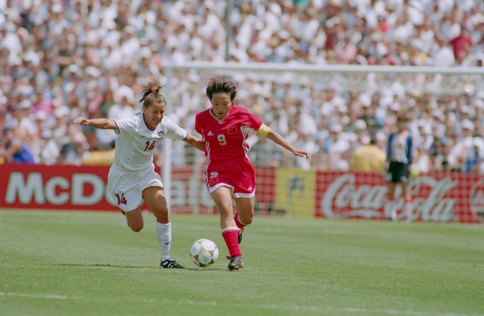 USWNT No 14 chases down China PR No 9 during the 1999 Womens World Cup Final