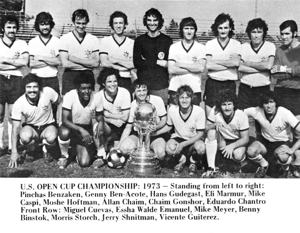 The 1973 Open Cup-winner Maccabees pose with the historic Dewar Cup