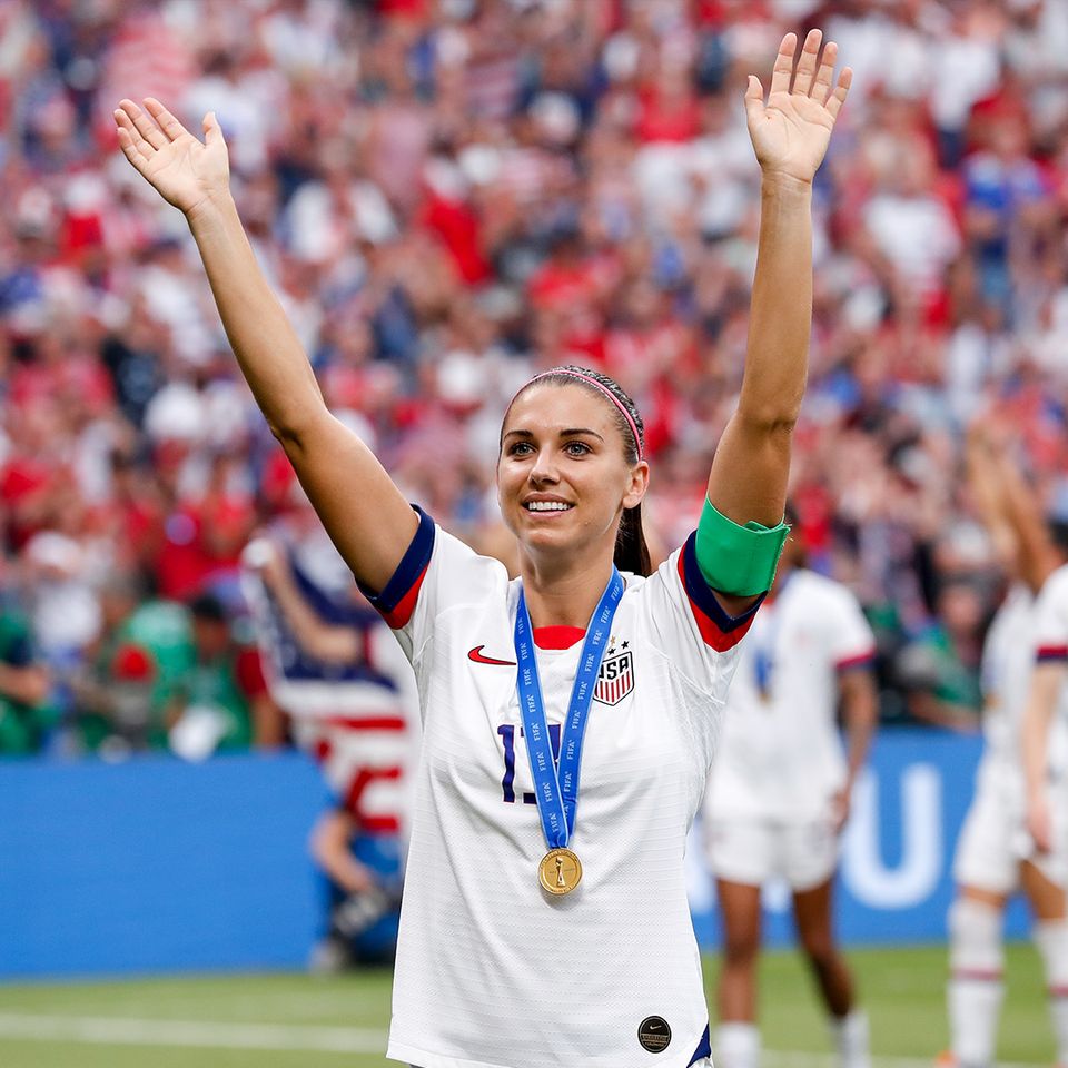 Alex Morgan waves to crowd after winning 2019 FIFA Women's World Cup