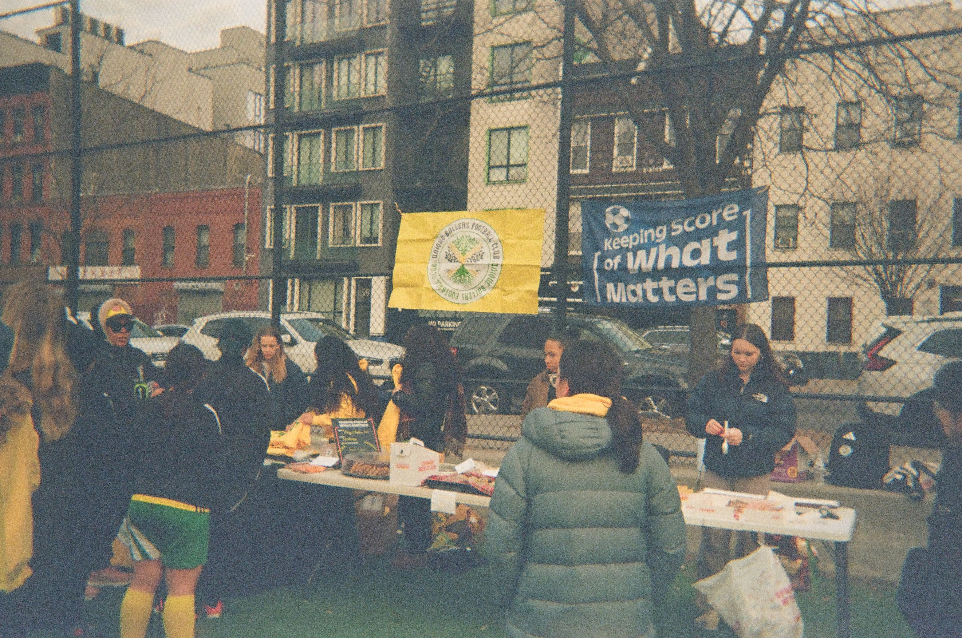 A sign up table at a soccer event.