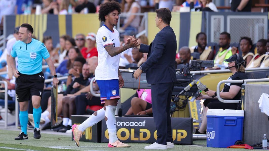 Chris Richards shaking hands with Mauricio Pochettino 