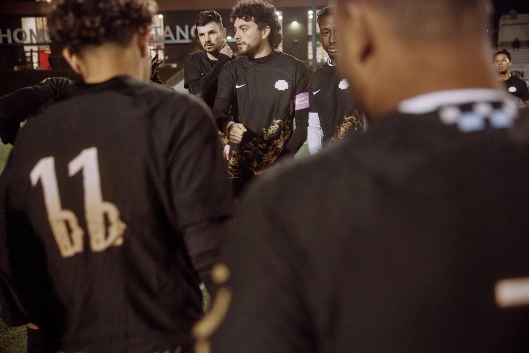 Virginia Dream huddled up on the field during a match