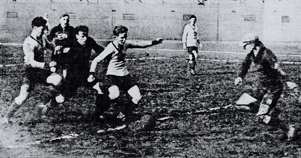 Old photo of a Detroit soccer team in action