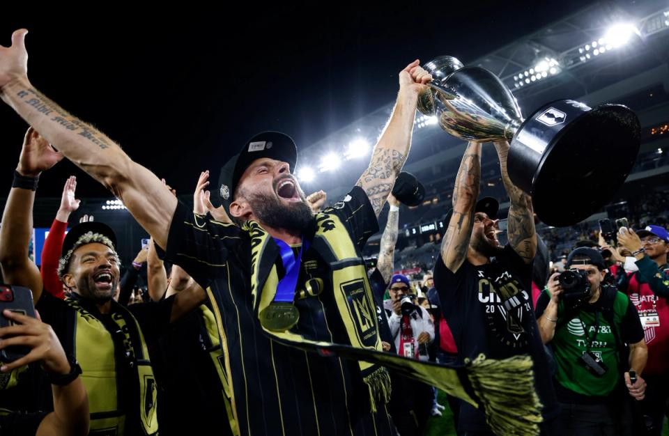 World Cup winner Olivier Giround and the 2024 Open Cup Champions LAFC celebrate