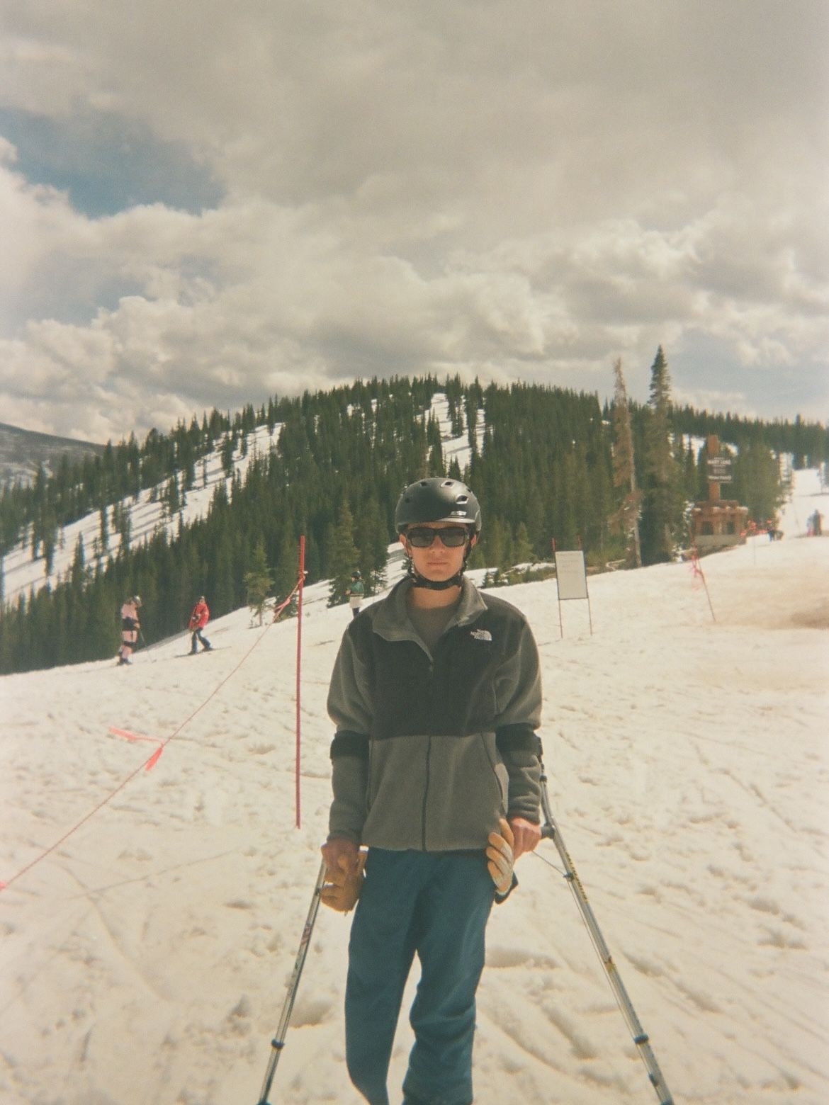 An amputee skier on a snowy slope