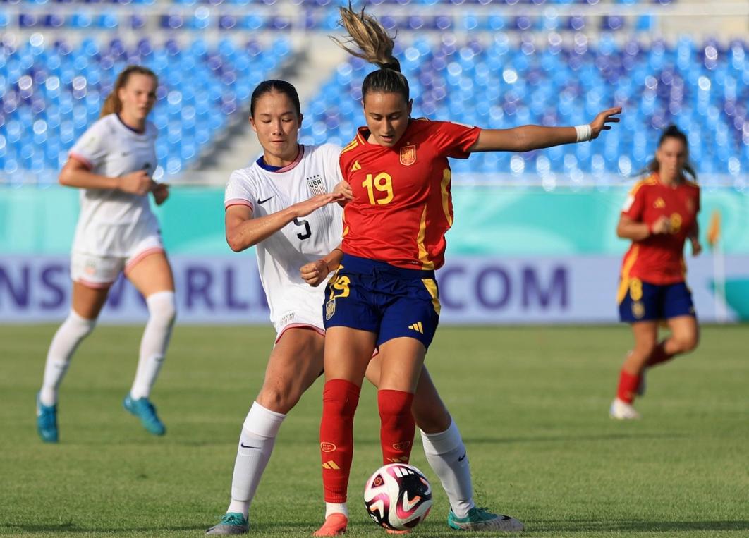 Kiara Gilmore battles a Spain player for the ball​​​​‌﻿‍﻿​‍​‍‌‍﻿﻿‌﻿​‍‌‍‍‌‌‍‌﻿‌‍‍‌‌‍﻿‍​‍​‍​﻿‍‍​‍​‍‌﻿​﻿‌‍​‌‌‍﻿‍‌‍‍‌‌﻿‌​‌﻿‍‌​‍﻿‍‌‍‍‌‌‍﻿﻿​‍​‍​‍﻿​​‍​‍‌‍‍​‌﻿​‍‌‍‌‌‌‍‌‍​‍​‍​﻿‍‍​‍​‍‌‍‍​‌﻿‌​‌﻿‌​‌﻿​​‌﻿​﻿​﻿‍‍​‍﻿﻿​‍﻿﻿‌﻿‌‌‌﻿​﻿‌﻿​﻿‌‍‌‍​‍﻿‍‌﻿​﻿‌‍​‌‌‍﻿‍‌‍‍‌‌﻿‌​‌﻿‍‌​‍﻿‍‌﻿​﻿‌﻿‌​‌﻿‌‌‌‍‌​‌‍‍‌‌‍﻿﻿​‍﻿﻿‌‍‍‌‌‍﻿‍‌﻿‌​‌‍‌‌‌‍﻿‍‌﻿‌​​‍﻿﻿‌‍‌‌‌‍‌​‌‍‍‌‌﻿‌​​‍﻿﻿‌‍﻿‌‌‍﻿﻿‌‍‌​‌‍‌‌​﻿﻿‌‌﻿​​‌﻿​‍‌‍‌‌‌﻿​﻿‌‍‌‌‌‍﻿‍‌﻿‌​‌‍​‌‌﻿‌​‌‍‍‌‌‍﻿﻿‌‍﻿‍​﻿‍﻿‌‍‍‌‌‍‌​​﻿﻿‌‌‍​‌​﻿‌‍​﻿‌‌​﻿‌‌​﻿​‍​﻿​​​﻿​﻿​﻿​‍​‍﻿‌​﻿​‍‌‍​﻿‌‍​‌‌‍‌‌​‍﻿‌​﻿‌​‌‍‌‍​﻿‌‌​﻿‌‍​‍﻿‌​﻿‍‌‌‍‌​​﻿‌﻿‌‍​‌​‍﻿‌​﻿‌﻿​﻿‍‌​﻿‍​​﻿‌‍​﻿​‍​﻿‌‍​﻿​​​﻿​﻿​﻿​﻿​﻿​﻿​﻿​​​﻿‌​​﻿‍﻿‌﻿‌​‌﻿‍‌‌﻿​​‌‍‌‌​﻿﻿‌‌﻿​﻿‌﻿‌​‌‍﻿﻿‌﻿​‍‌﻿‍‌​﻿‍﻿‌﻿​​‌‍​‌‌﻿‌​‌‍‍​​﻿﻿‌‌‍​﻿‌‍﻿﻿‌‍﻿‍‌﻿‌​‌‍‌‌‌‍﻿‍‌﻿‌​​‍‌‌​﻿‌‌‌​​‍‌‌﻿﻿‌‍‍﻿‌‍‌‌‌﻿‍‌​‍‌‌​﻿​﻿‌​‌​​‍‌‌​﻿​﻿‌​‌​​‍‌‌​﻿​‍​﻿​‍​﻿‍‌​﻿‌‍​﻿‌​‌‍‌‌​﻿​﻿​﻿‌‍​﻿‌‍​﻿‌﻿​﻿​﻿​﻿​‍​﻿​‌‌‍‌‌​‍‌‌​﻿​‍​﻿​‍​‍‌‌​﻿‌‌‌​‌​​‍﻿‍‌‍‍‌‌‍﻿‌‌‍​‌‌‍‌﻿‌‍‌‌‌​‌​‌‍‌‌‌﻿​﻿‌‍‍﻿‌﻿‌​‌‍﻿﻿‌﻿​​​‍﻿‍‌‍​‌‌‍﻿​‌﻿‌​​﻿﻿﻿‌‍​‍‌‍​‌‌﻿​﻿‌‍‌‌‌‌‌‌‌﻿​‍‌‍﻿​​﻿﻿‌‌‍‍​‌﻿‌​‌﻿‌​‌﻿​​‌﻿​﻿​‍‌‌​﻿​﻿‌​​‌​‍‌‌​﻿​‍‌​‌‍​‍‌‌​﻿​‍‌​‌‍‌﻿‌‌‌﻿​﻿‌﻿​﻿‌‍‌‍​‍﻿‍‌﻿​﻿‌‍​‌‌‍﻿‍‌‍‍‌‌﻿‌​‌﻿‍‌​‍﻿‍‌﻿​﻿‌﻿‌​‌﻿‌‌‌‍‌​‌‍‍‌‌‍﻿﻿​‍‌‍‌‍‍‌‌‍‌​​﻿﻿‌‌‍​‌​﻿‌‍​﻿‌‌​﻿‌‌​﻿​‍​﻿​​​﻿​﻿​﻿​‍​‍﻿‌​﻿​‍‌‍​﻿‌‍​‌‌‍‌‌​‍﻿‌​﻿‌​‌‍‌‍​﻿‌‌​﻿‌‍​‍﻿‌​﻿‍‌‌‍‌​​﻿‌﻿‌‍​‌​‍﻿‌​﻿‌﻿​﻿‍‌​﻿‍​​﻿‌‍​﻿​‍​﻿‌‍​﻿​​​﻿​﻿​﻿​﻿​﻿​﻿​﻿​​​﻿‌​​‍‌‍‌﻿‌​‌﻿‍‌‌﻿​​‌‍‌‌​﻿﻿‌‌﻿​﻿‌﻿‌​‌‍﻿﻿‌﻿​‍‌﻿‍‌​‍‌‍‌﻿​​‌‍​‌‌﻿‌​‌‍‍​​﻿﻿‌‌‍​﻿‌‍﻿﻿‌‍﻿‍‌﻿‌​‌‍‌‌‌‍﻿‍‌﻿‌​​‍‌‌​﻿‌‌‌​​‍‌‌﻿﻿‌‍‍﻿‌‍‌‌‌﻿‍‌​‍‌‌​﻿​﻿‌​‌​​‍‌‌​﻿​﻿‌​‌​​‍‌‌​﻿​‍​﻿​‍​﻿‍‌​﻿‌‍​﻿‌​‌‍‌‌​﻿​﻿​﻿‌‍​﻿‌‍​﻿‌﻿​﻿​﻿​﻿​‍​﻿​‌‌‍‌‌​‍‌‌​﻿​‍​﻿​‍​‍‌‌​﻿‌‌‌​‌​​‍﻿‍‌‍‍‌‌‍﻿‌‌‍​‌‌‍‌﻿‌‍‌‌‌​‌​‌‍‌‌‌﻿​﻿‌‍‍﻿‌﻿‌​‌‍﻿﻿‌﻿​​​‍﻿‍‌‍​‌‌‍﻿​‌﻿‌​​‍​‍‌﻿﻿‌