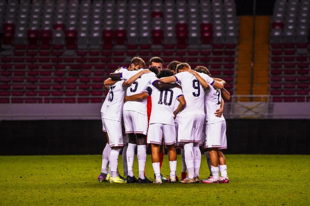 The US U17 MNT huddles up on the field during a match against the U.S. Virgin Islands