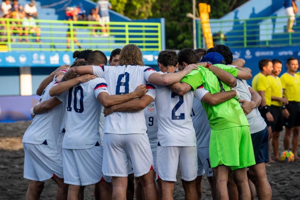 The Beach MNT huddles up on the sand