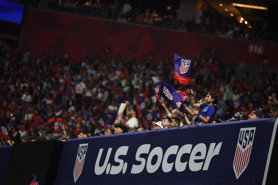 Fans of United States wave flags during the match between United States and Portugal at Mercedes-Benz Stadium on March 31, 2026 in Atlanta, Georgia.(Photo by Jared C. Tilton/Getty Images)