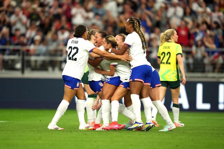 The US Women's National Team celebrates after scoring a goal against Australia