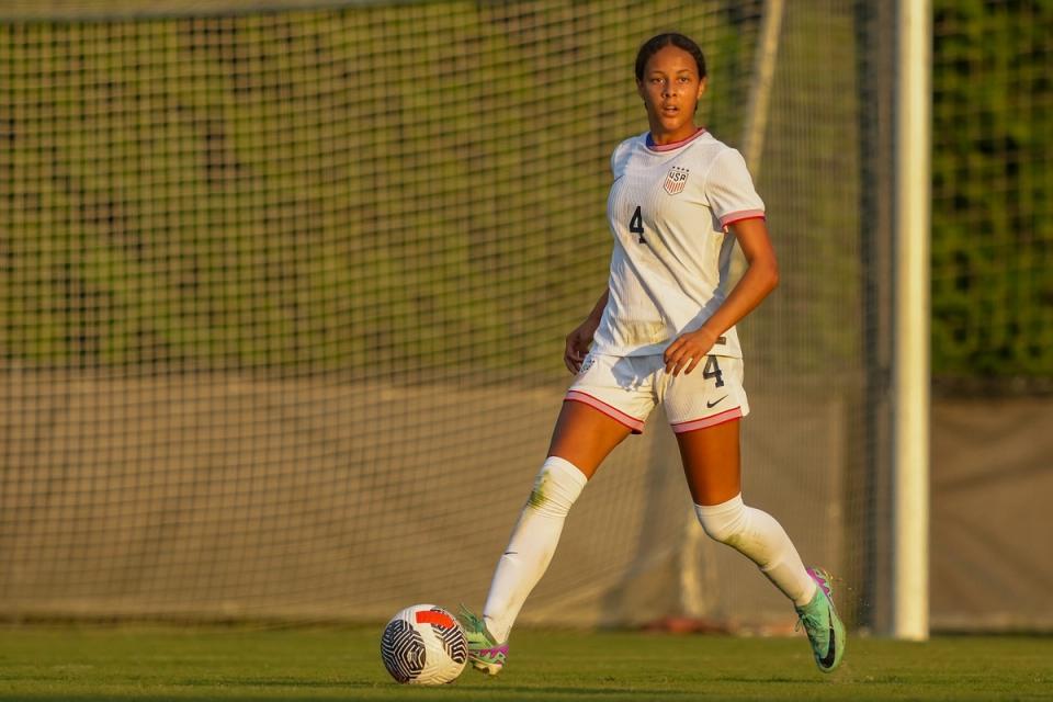 Jordyn Bugg with the ball in front of goal during a match