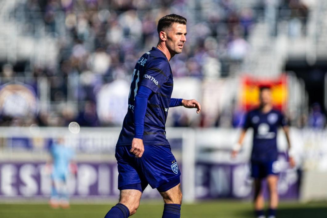McCabe looks on during a Louisville City match