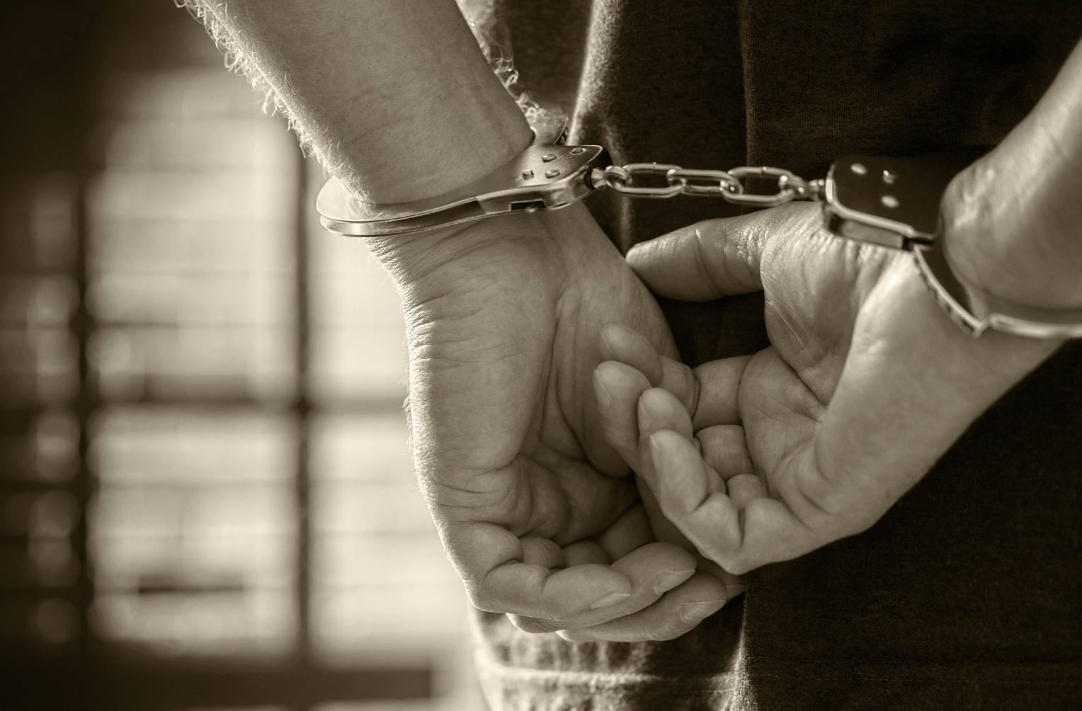 Hand Cuffs Criminal Defense AOP