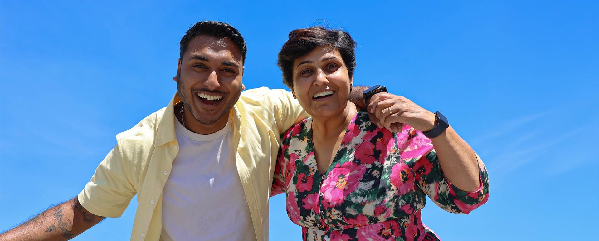 man and lady smiling at camera