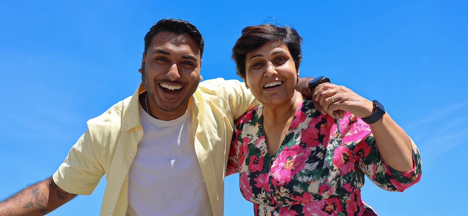 man and lady smiling at camera