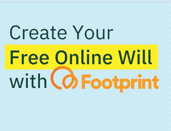 a man is squatting under a tree in a park .