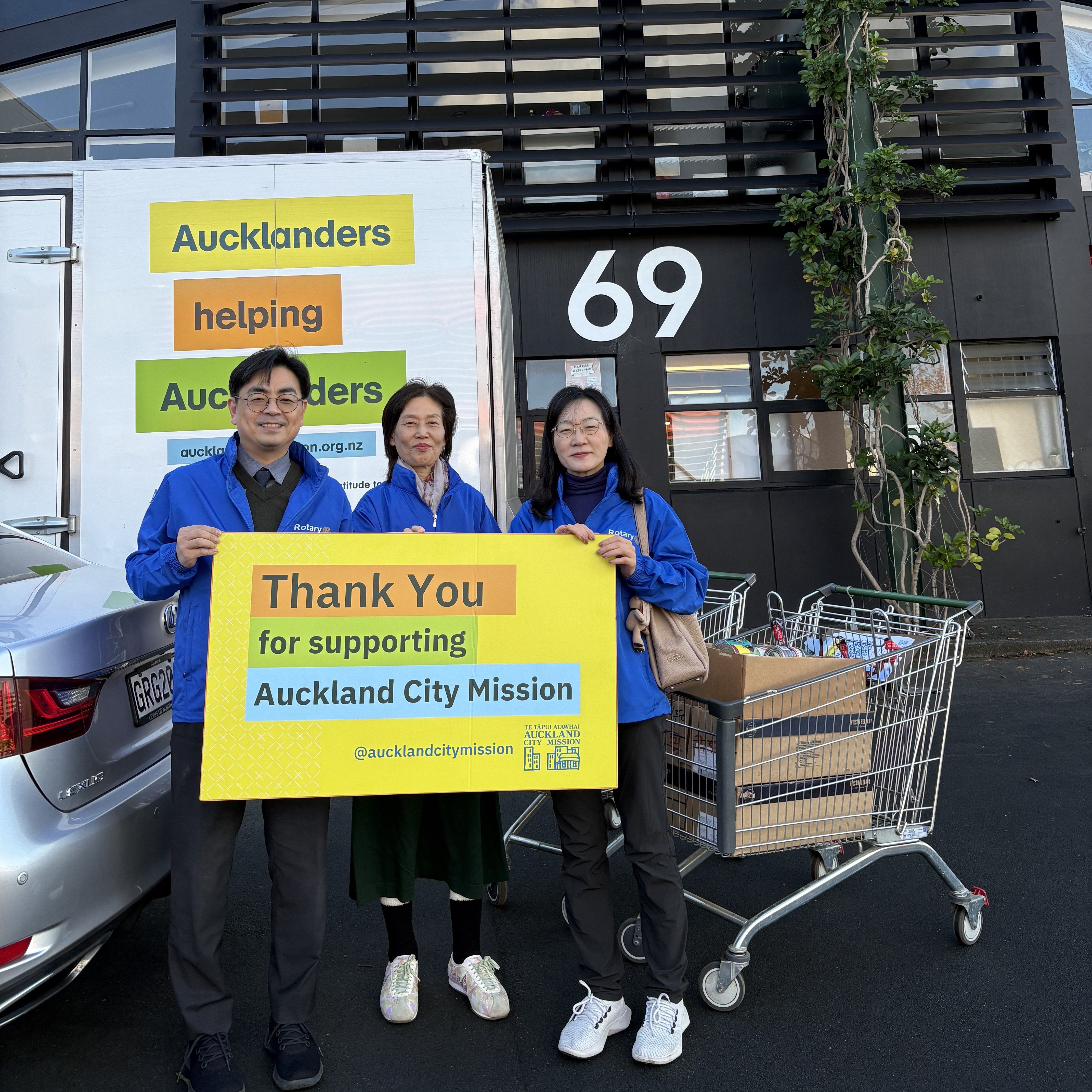 a room filled with shelves filled with cans and bags of food .