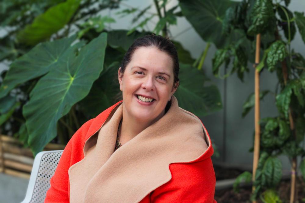 a man wearing a shirt that says auckland city mission