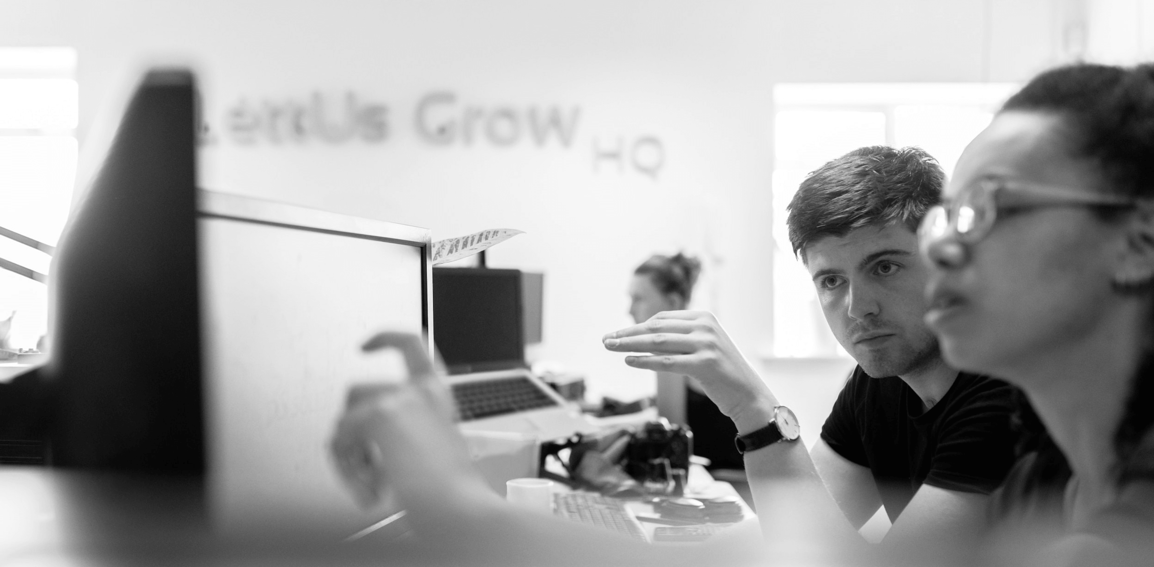 Picture of people working in.a office.