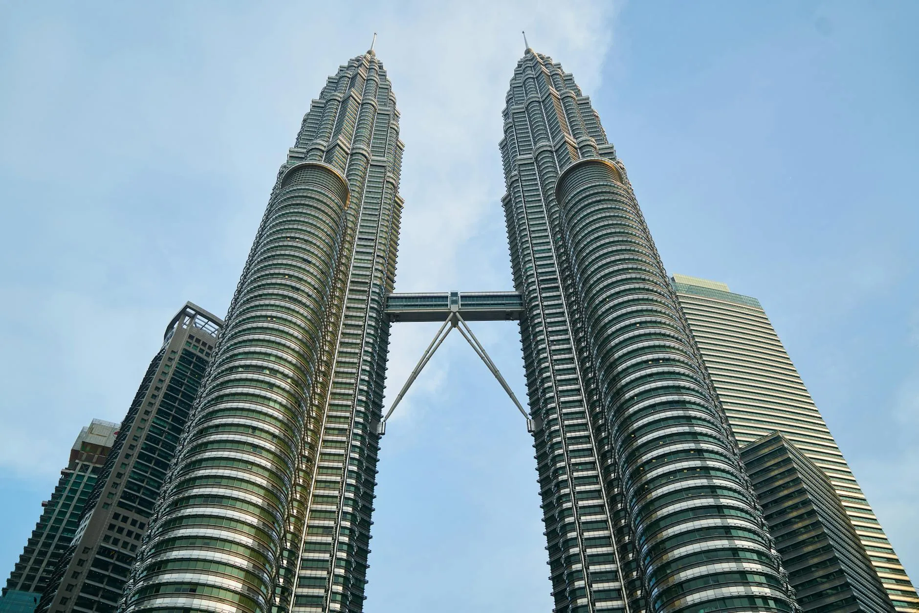 Stunning view of the Petronas Twin Towers against the blue sky in Kuala Lumpur, Malaysia.