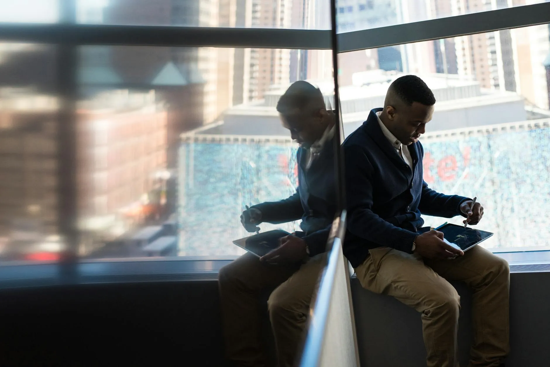 IT professional conducting wireless network survey with tablet