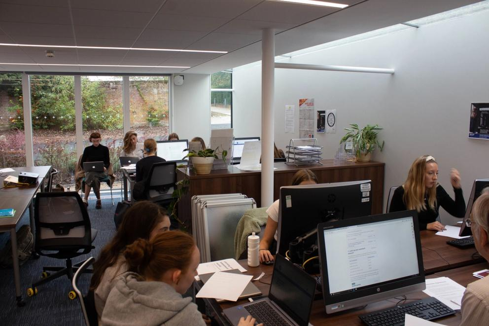 image of students sitting in law clinic