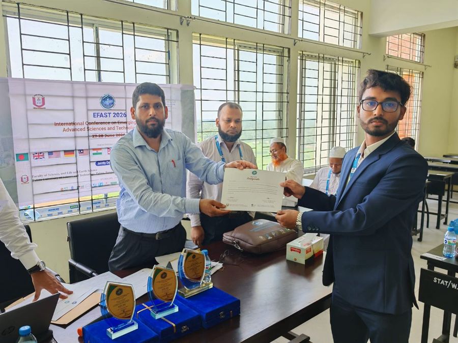 Shohag receiving a certificate from faculty members