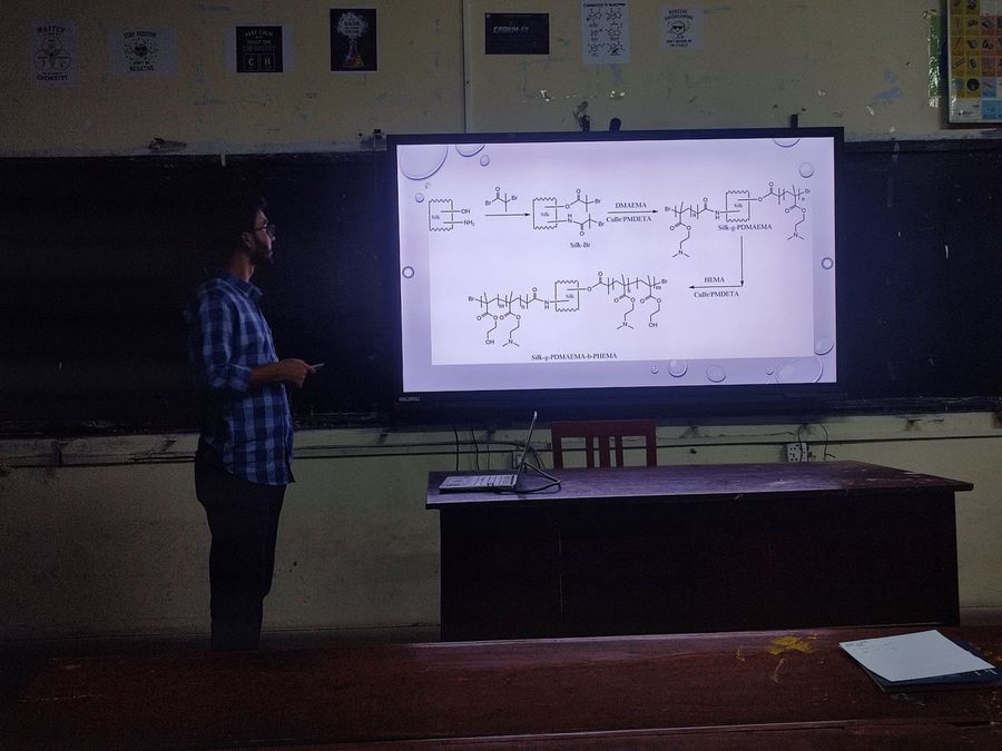 Shohag presenting the silk graft-copolymer synthesis scheme on screen