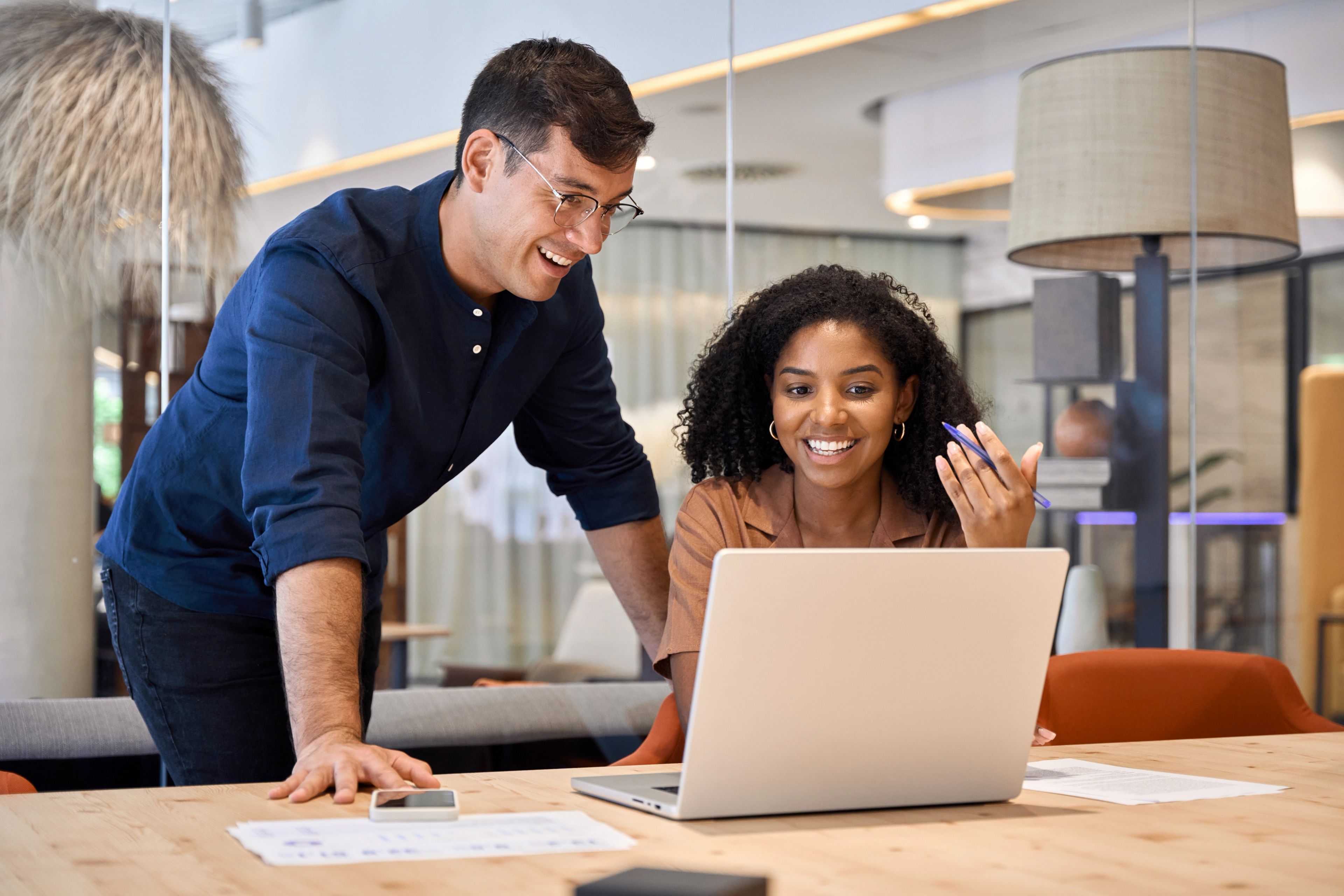 man and women reviewing website