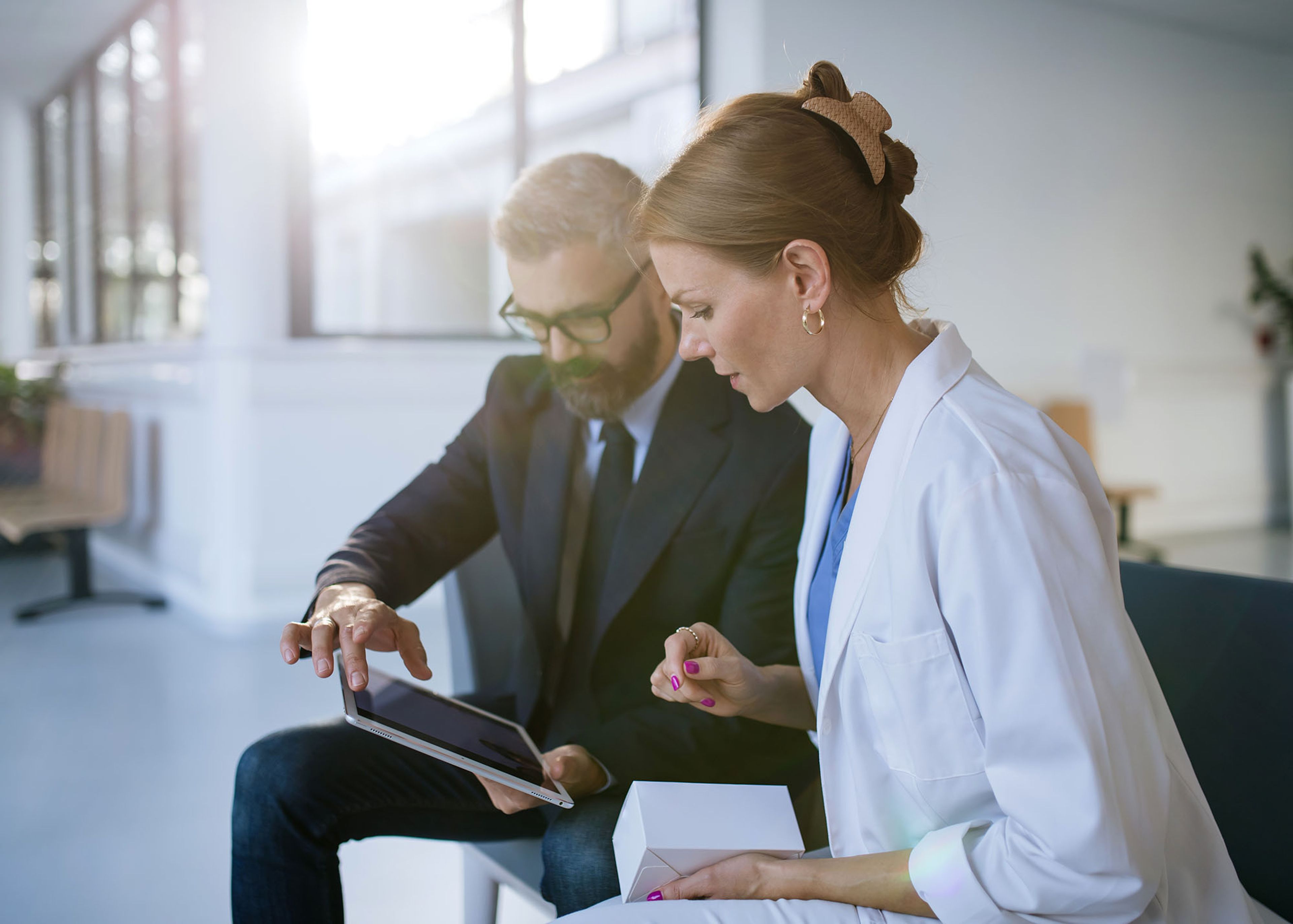 salesperson and client with crm