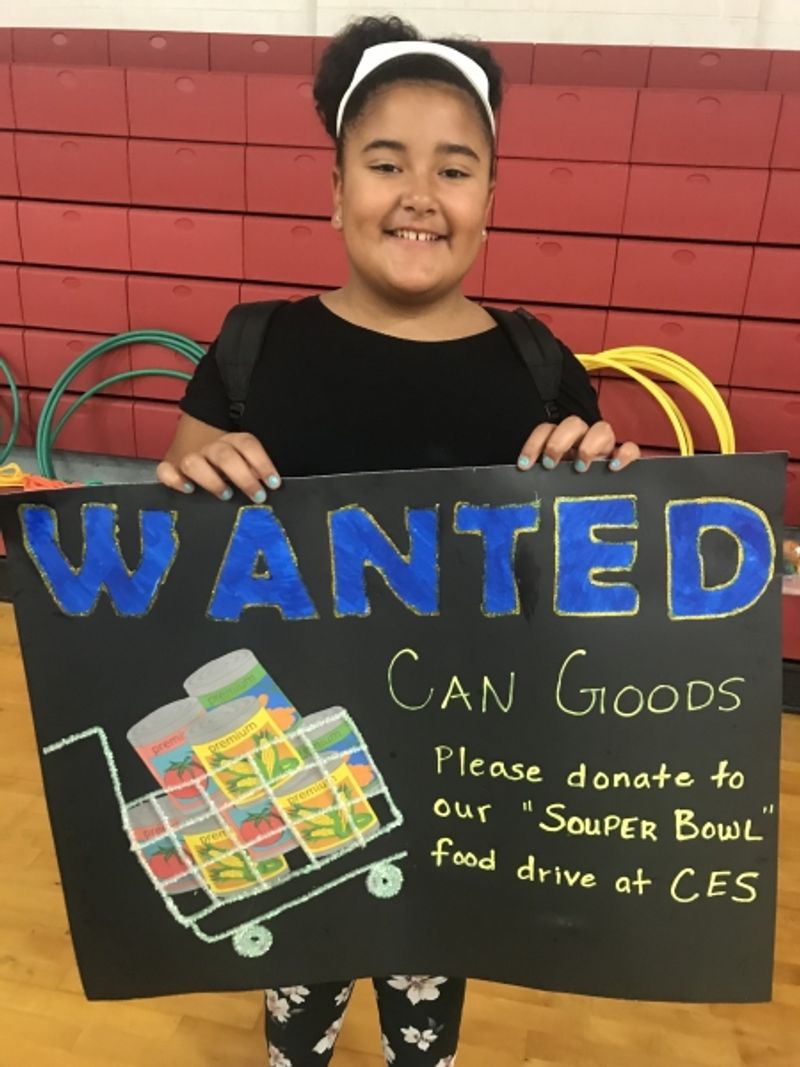 girl with fundraising sign