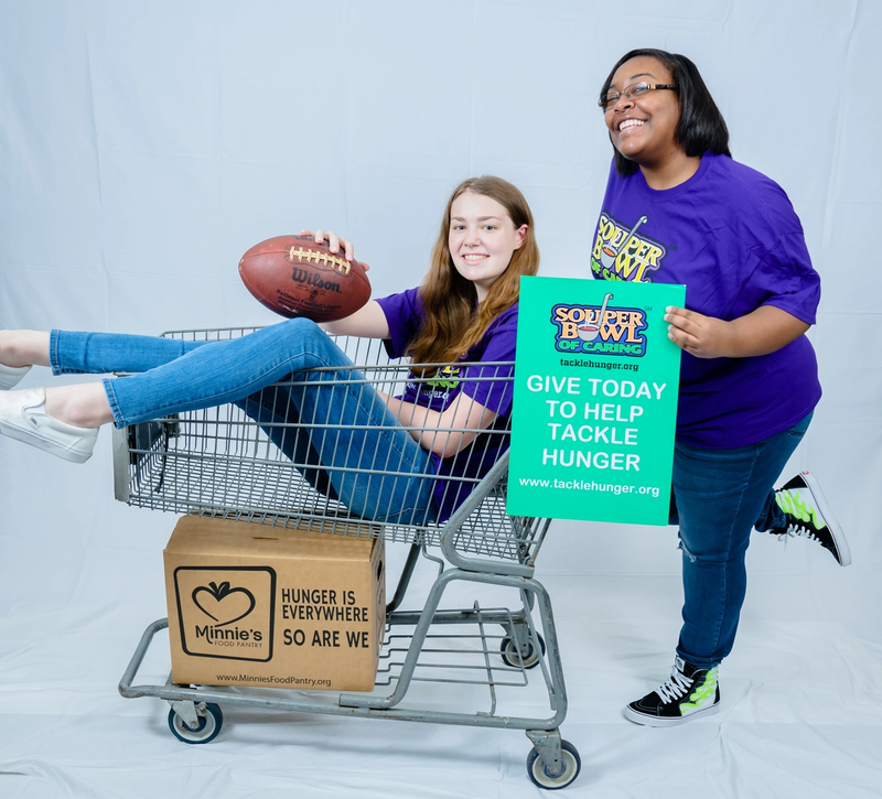 volunteers with grocery cart