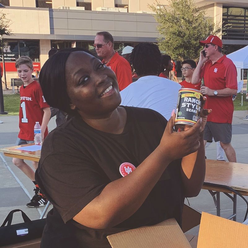 female volunteer showing donated food