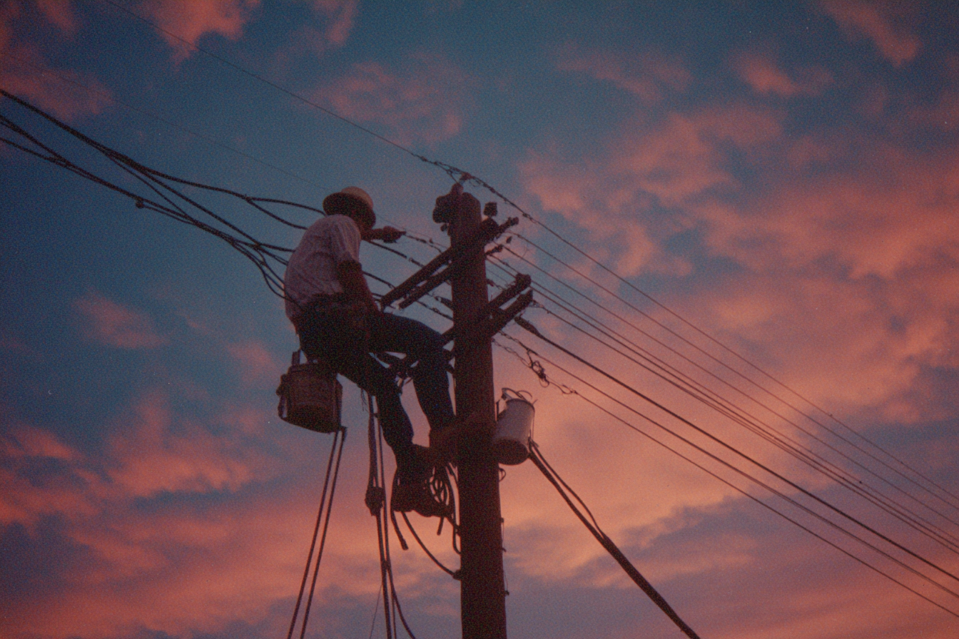 1970s Telephone Lineman Working on Pole Photograph