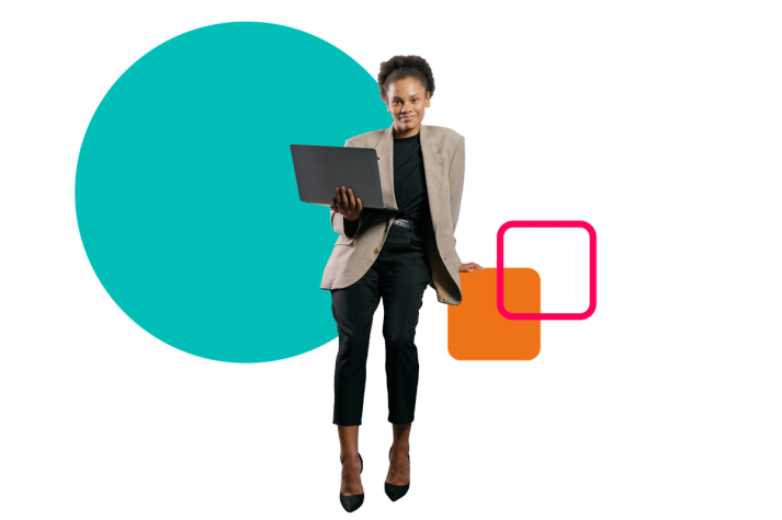 A person holds a laptop amongst some abstract shapes