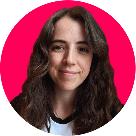 Headshot of Katie Roberts on a bright pink background