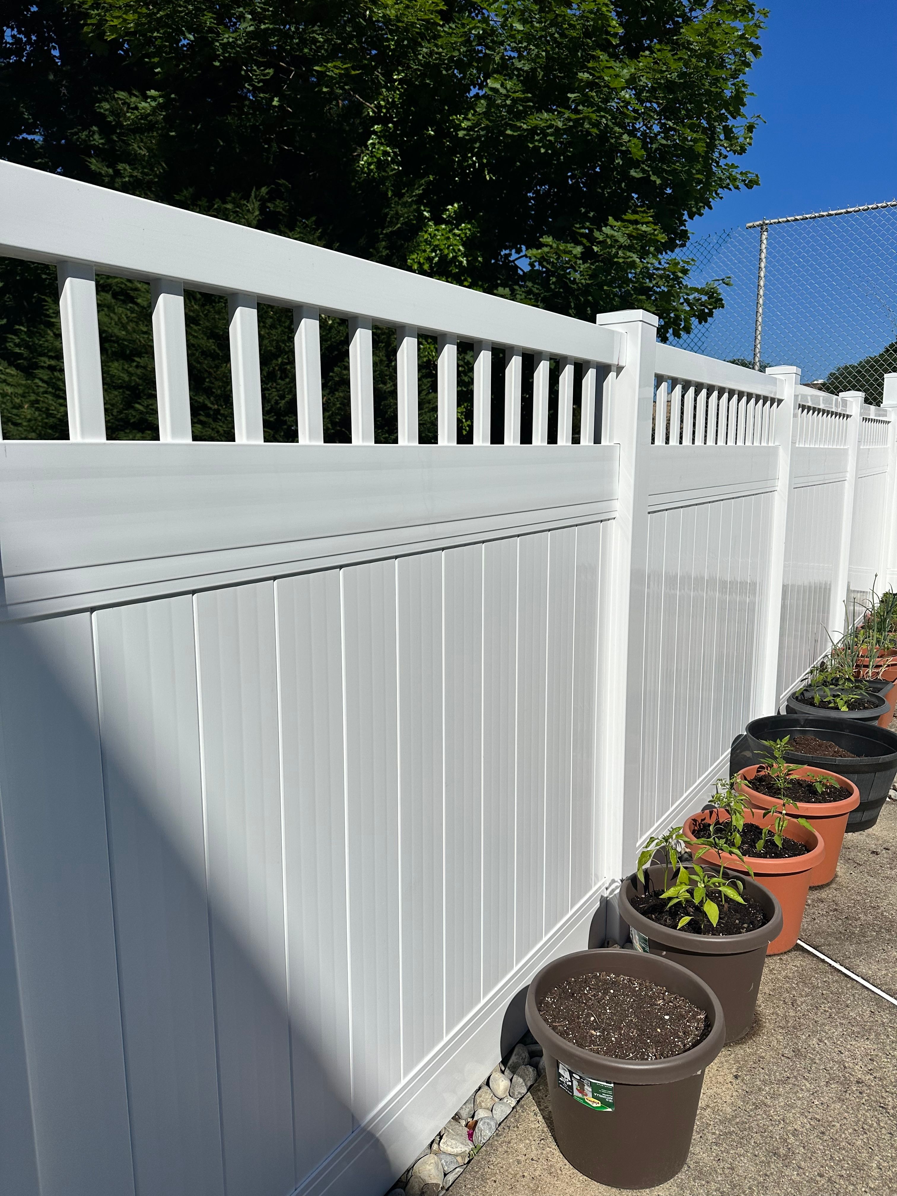 completerd 6-foot white semi-privacy vinyl fence in ridley park pool area