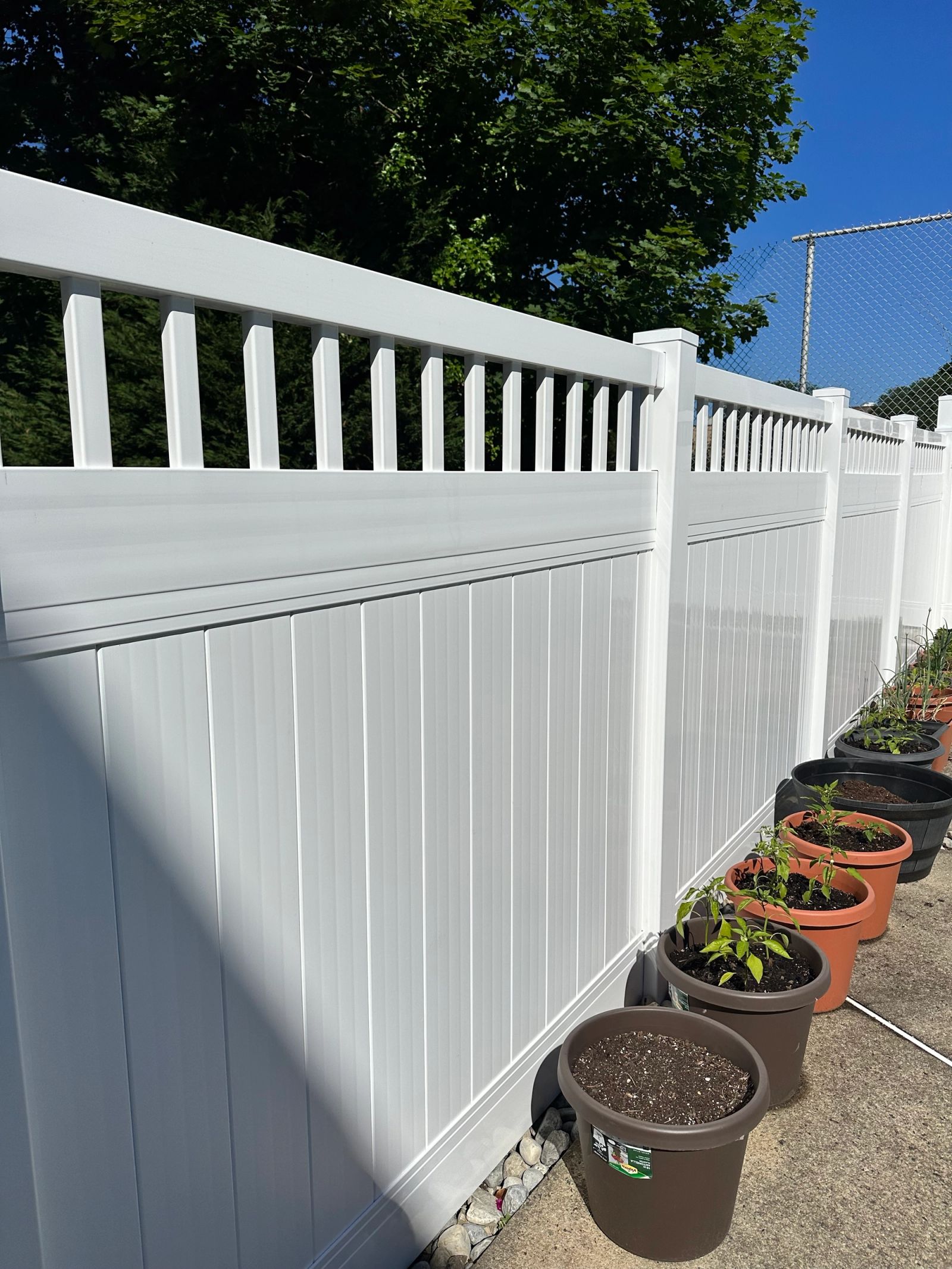 completerd 6-foot white semi-privacy vinyl fence in ridley park pool area