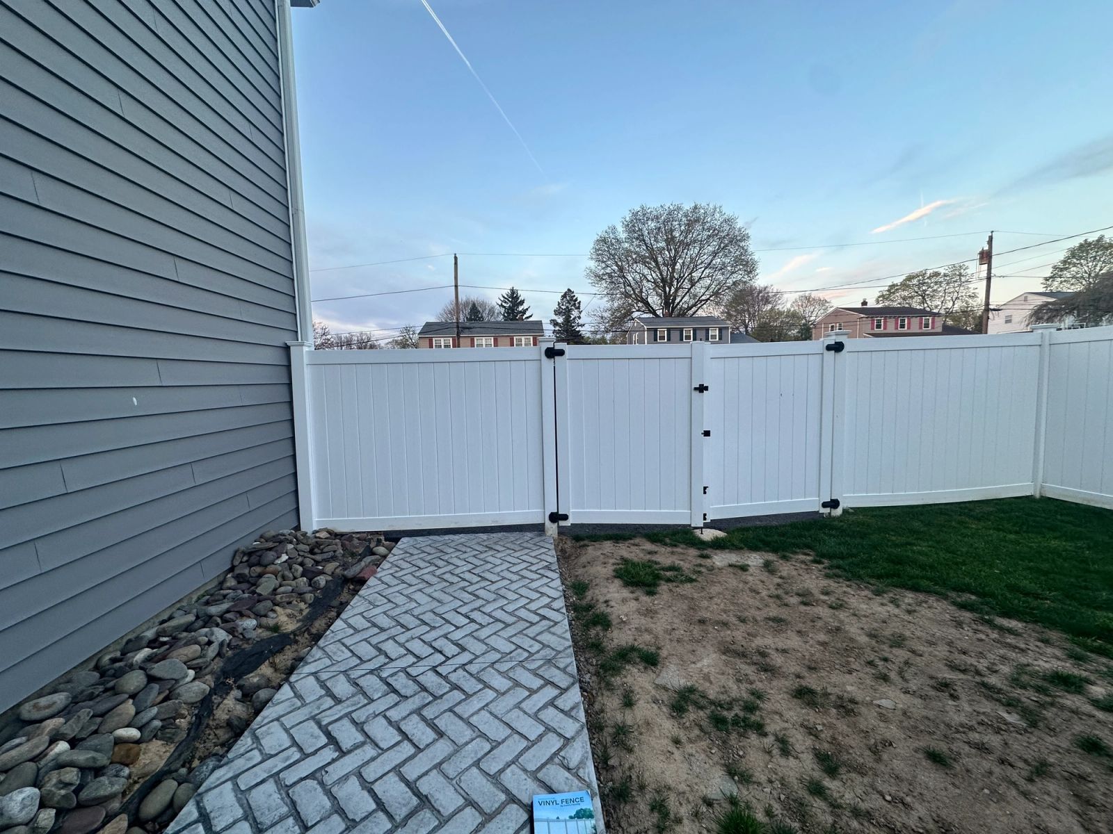 before image of vinyl privacy gates