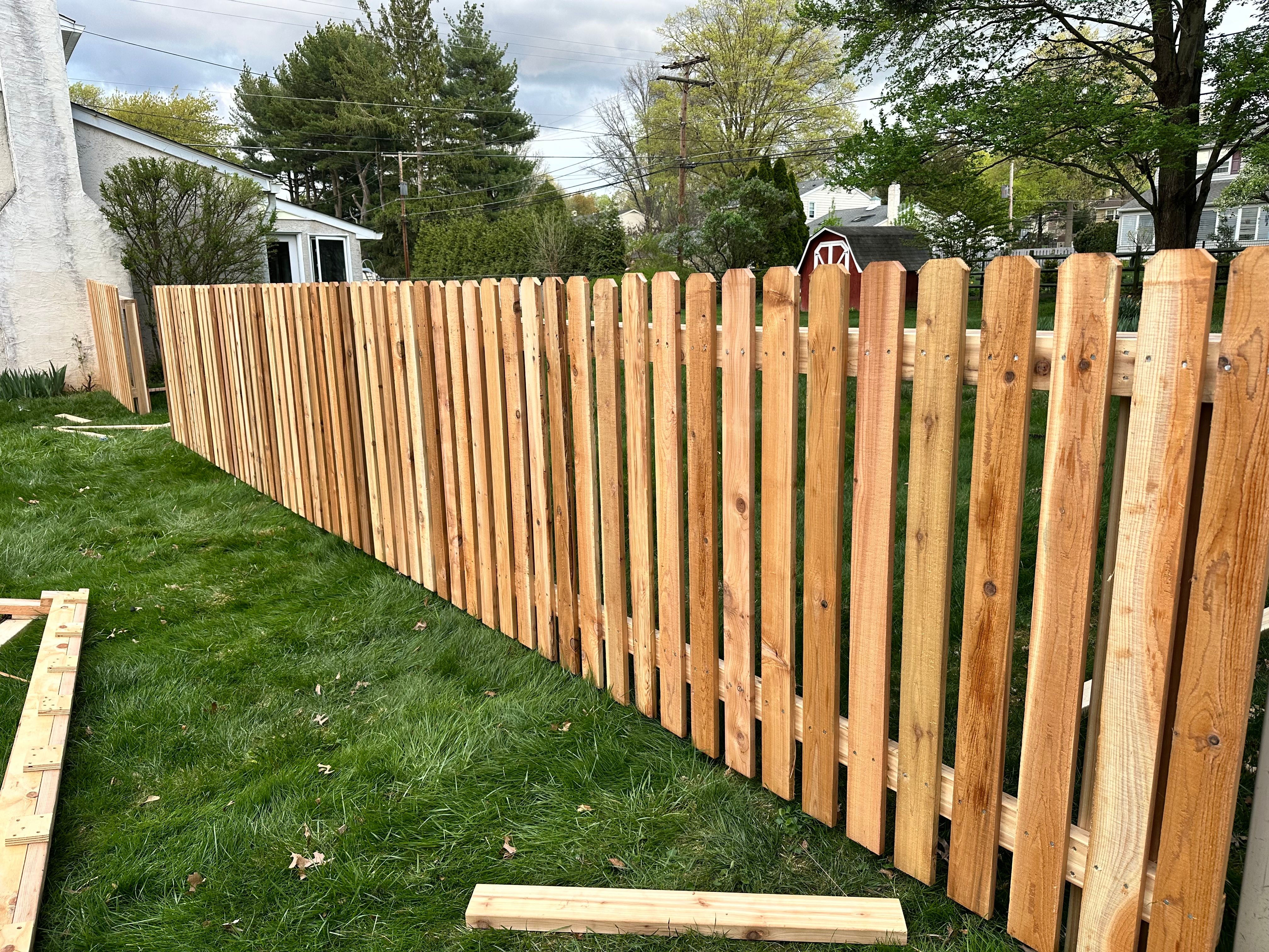 Cedar picket fence in progress